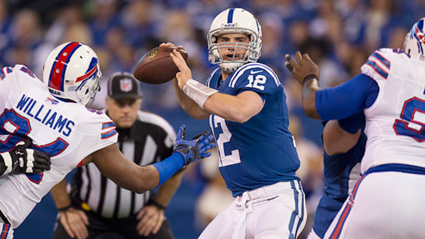 colin-kaepernick-extension-andrew-luck.jpg